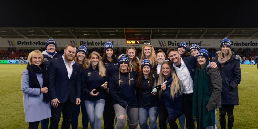 Rising female rugby stars watch Sale Sharks in action, thanks to tickets donated by Printerland